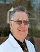 Riley H. Lunn, DDS, FAGD, FICD, FACD